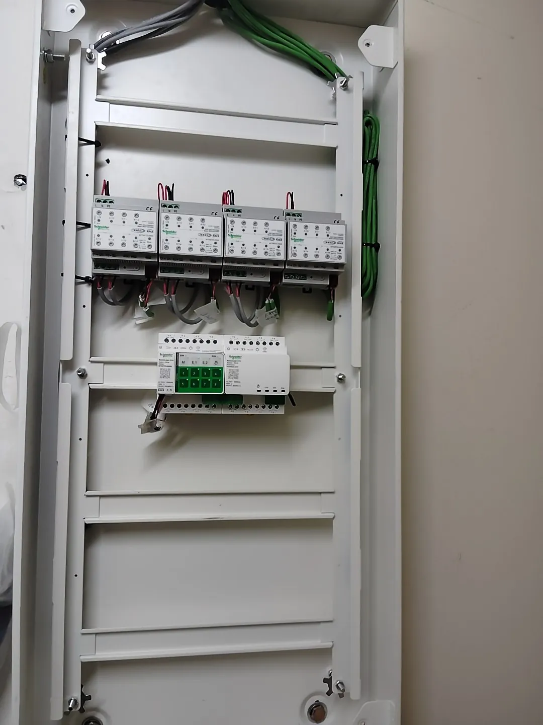 Partly fitted lighting-control panel with the first modules installed