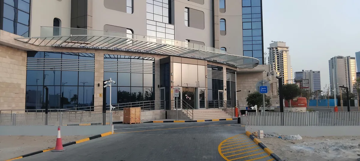 Voya Tower main entrance seen from the access road