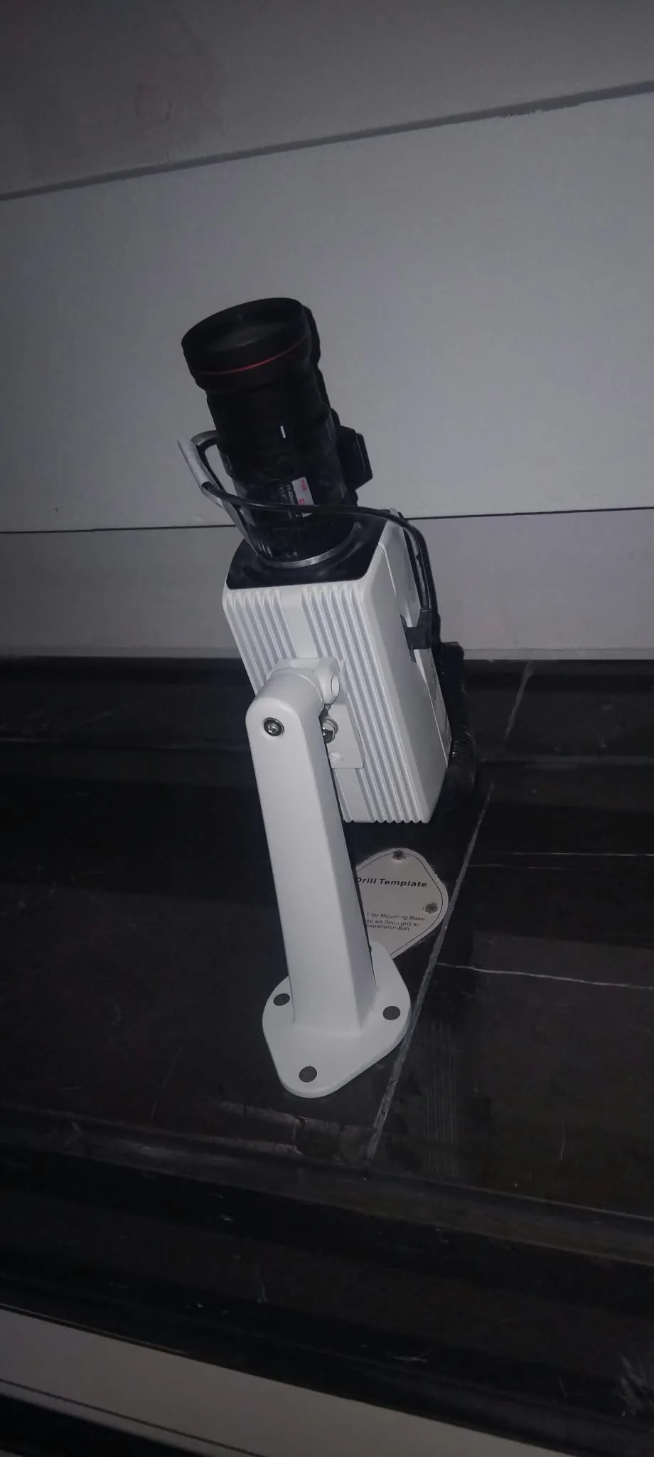 Box CCTV camera installed on its wall bracket at Voya Tower