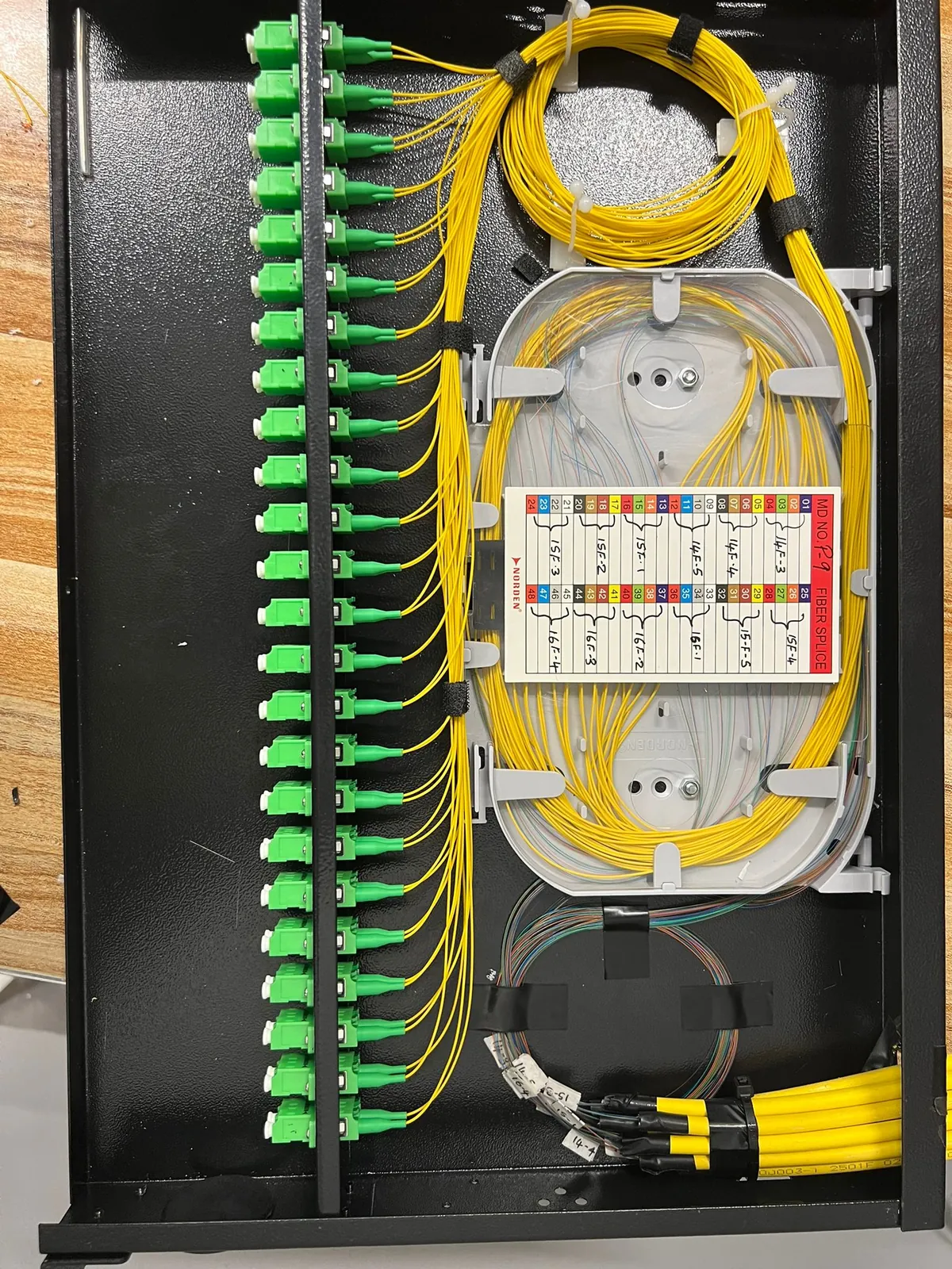 Second fiber splice enclosure with its splice tray and connectors fitted